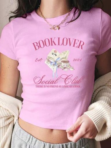 Young woman in a pink T-shirt with "Book Lover" and a graphic of open books.